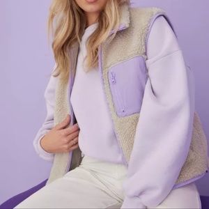 VERO MODA cream fuzzy zip up vest with purple pocket